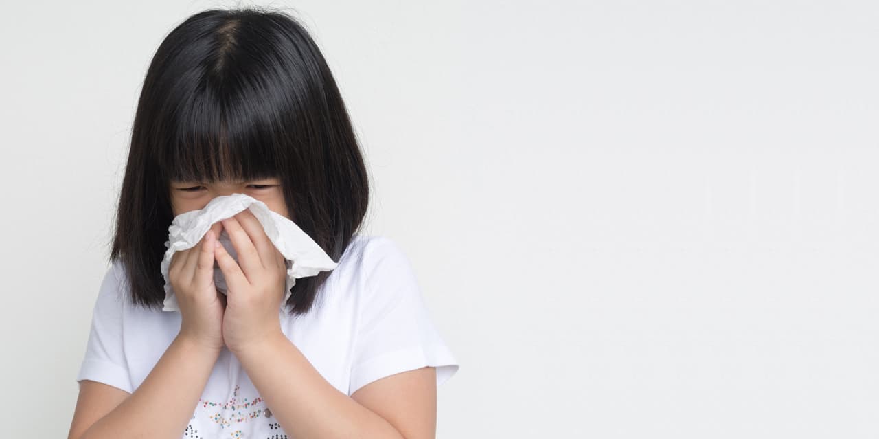 Girl showing influenza symptoms like cold